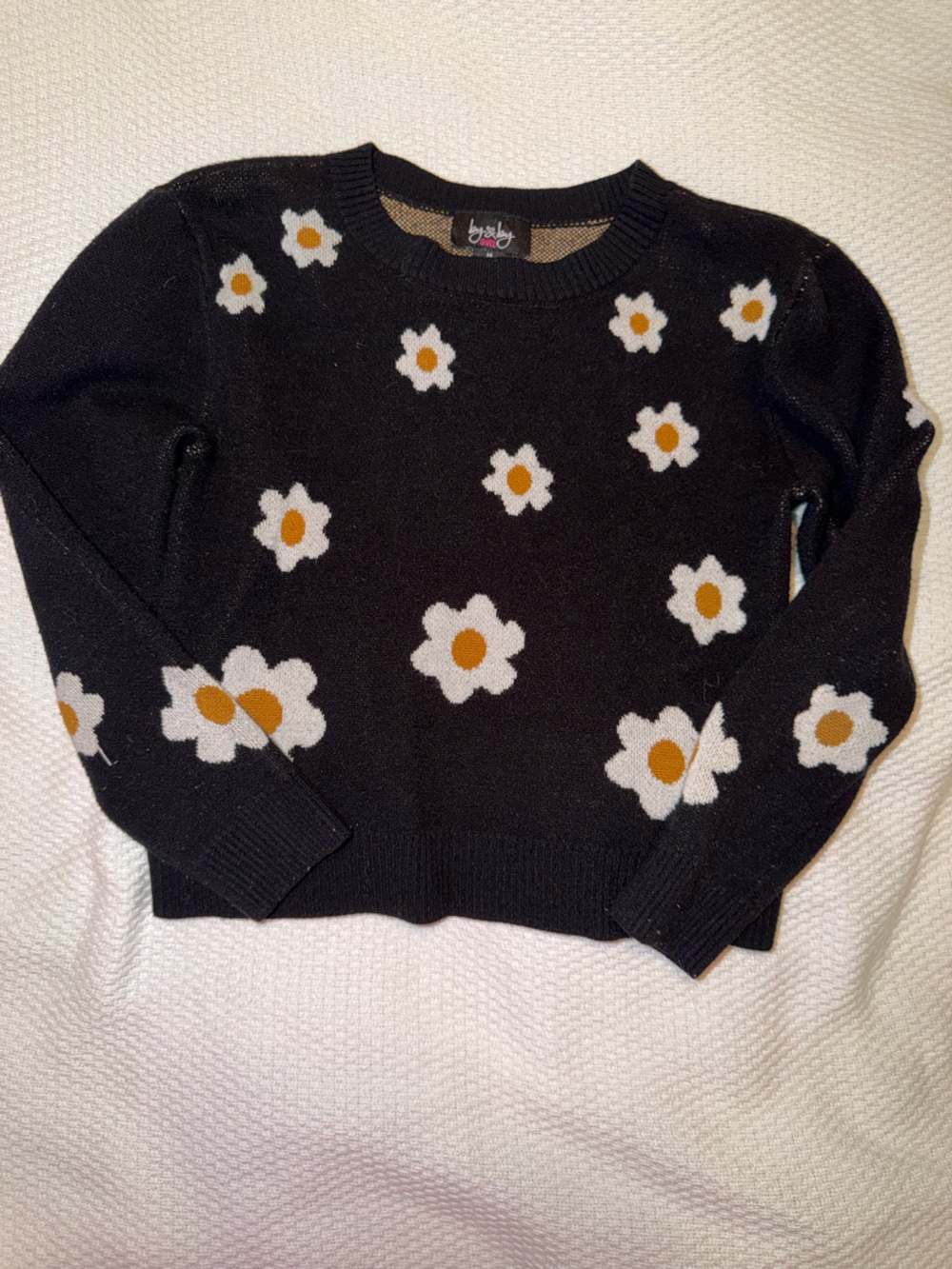 by & by Black Sweater with White and Mustard Daisy Pattern